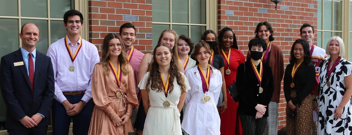 Image of students at FSU wearing medals.