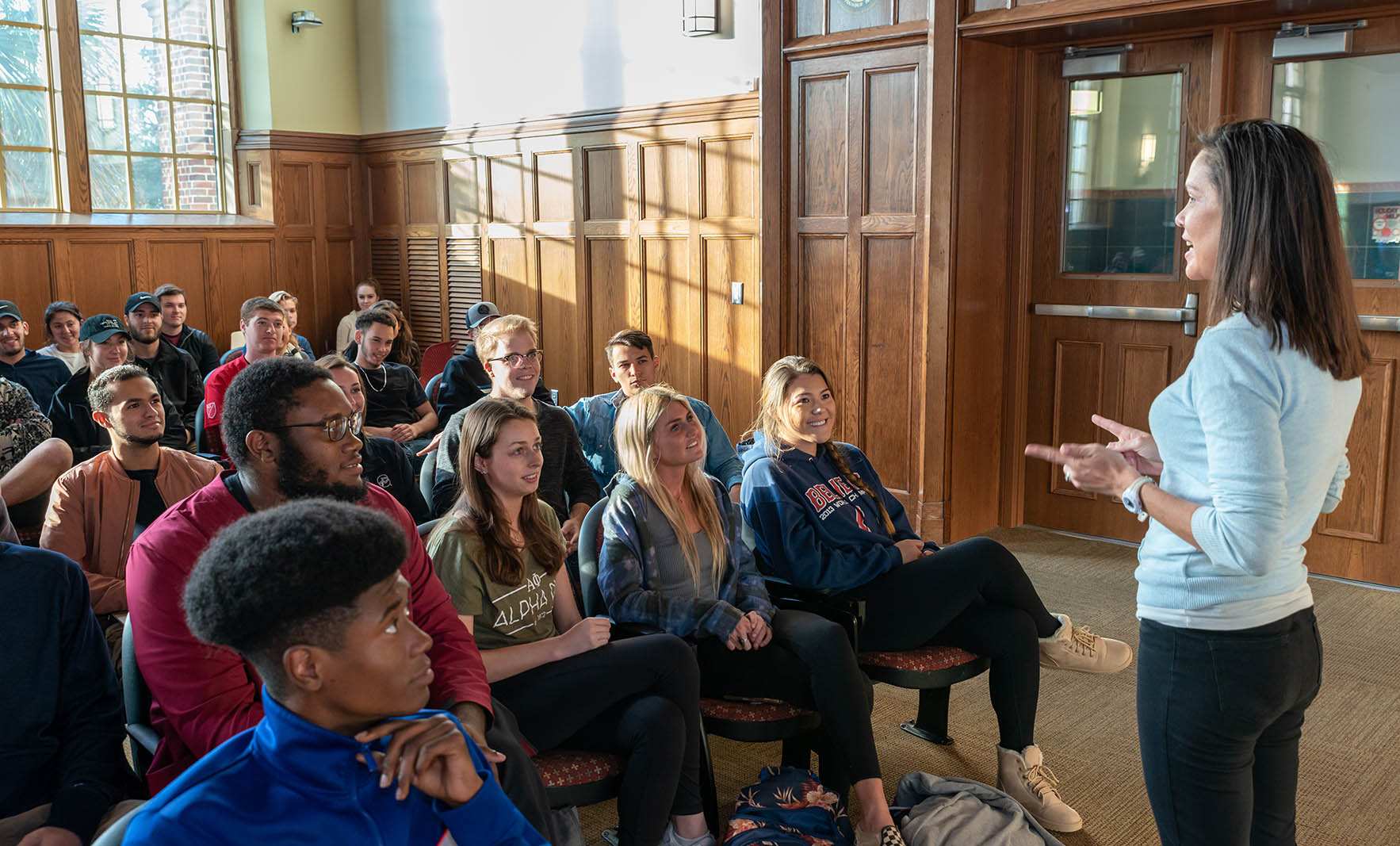 Students listening to professor's lecture.
